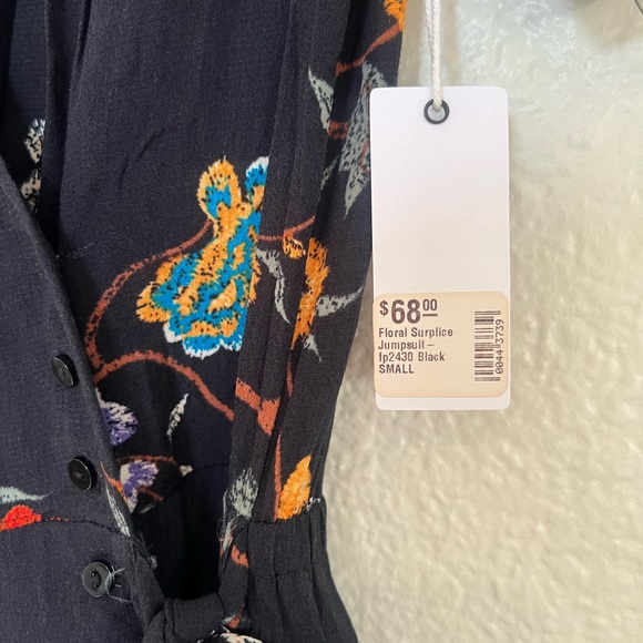 Stitch and feather never worn before with tags on romper. - Picture 3 of 4